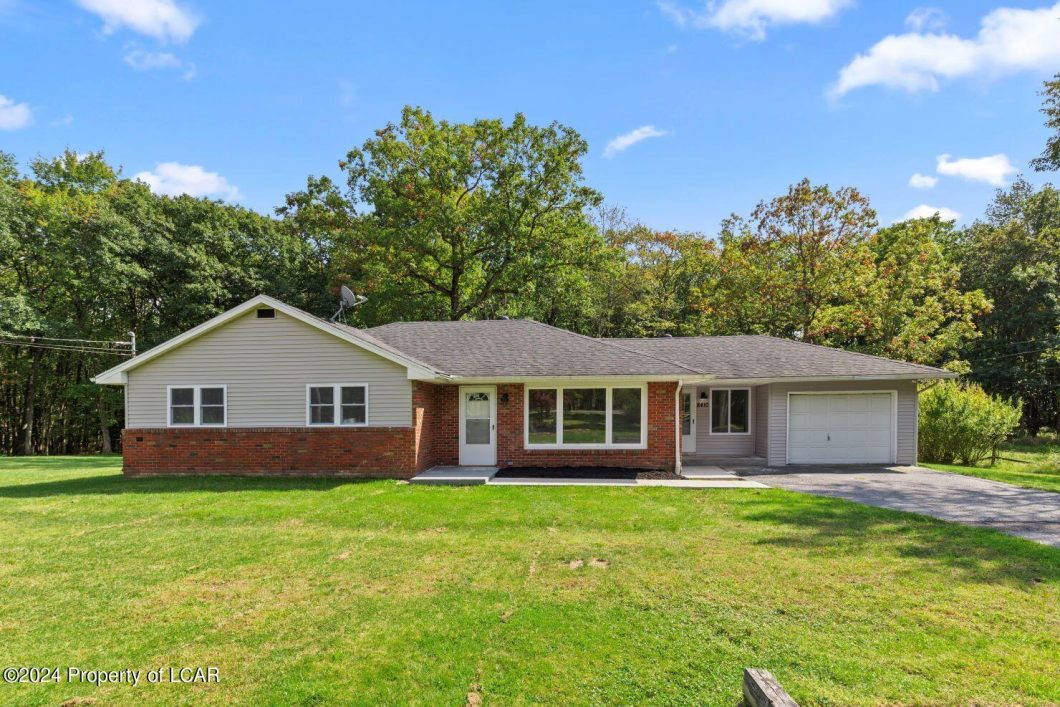 Button Real Estate - 8410 Bear Creek Boulevard
